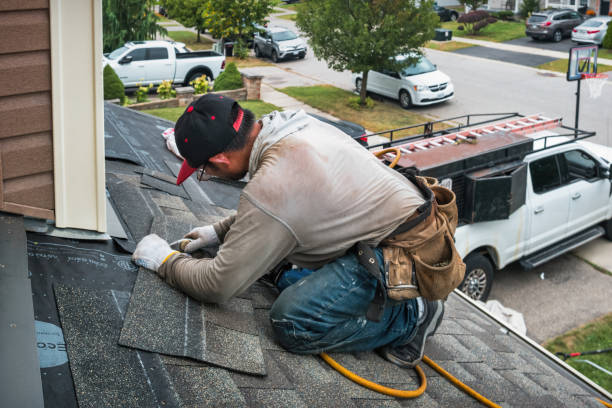 Professional Gutter Repair And Installation technician working in Mason City, IA